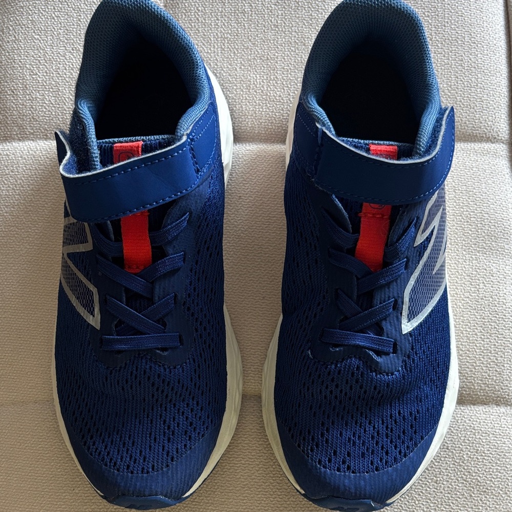 New Balance Navy Blue Kids Sneakers with Red Accent
